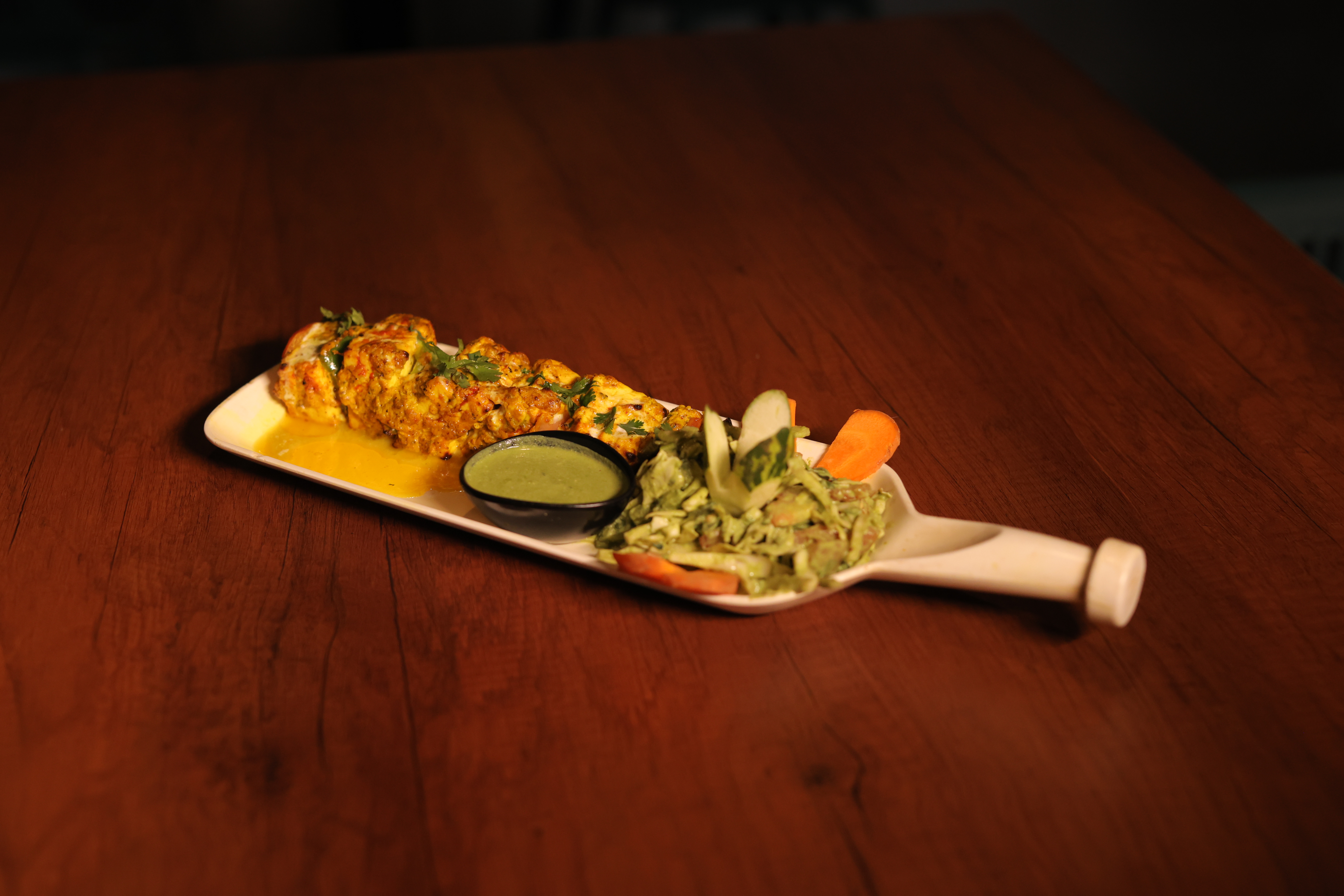 Golden paneer tikka platter with green chutney at Jatra Countryside